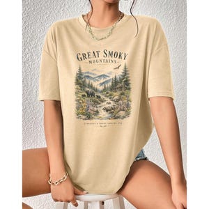 Great Smoky Mountains t-shirt with bears, cabin, and eagle graphic.