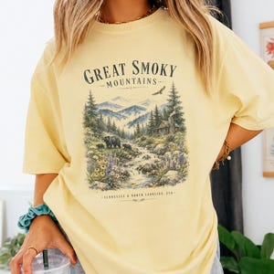 Great Smoky Mountains graphic on a yellow t-shirt with nature scene.