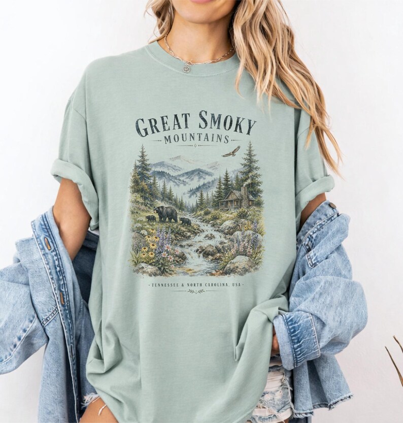 Great Smoky Mountains t-shirt with waterfall, bears, cabin, and text.