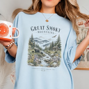 Graphic of Great Smoky Mountains with bears, cabin, and waterfall, Tennessee & North Carolina, USA.