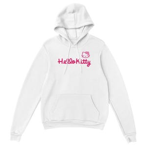 以下が含まれることがあります： ピンク色の「Hello Kitty」の文字と、キャラクターの顔のグラフィックが特徴の白いフード付きスウェットシャツ。スウェットシャツにはカンガルーポケットとドローストリングフードが付いています。
