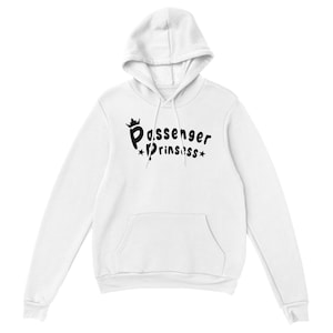 May include: White hooded sweatshirt with a front pocket and a drawstring hood. The black text on the front reads "Passenger Prinssss" with a crown and star accents. A casual, comfortable garment.