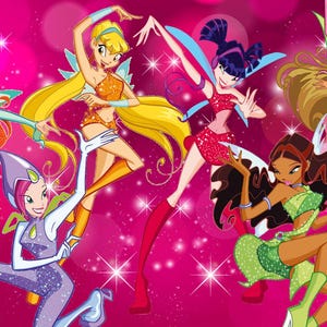 May include: Illustration of six animated fairies in colorful outfits, posing against a pink background with sparkling effects. The fairies have various skin tones, hairstyles, and wing designs, with the "Winx Club" logo in the bottom right corner.