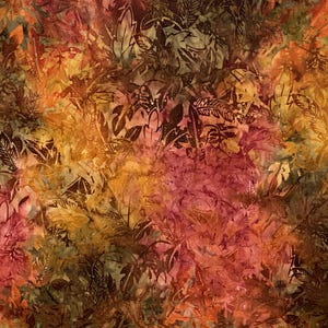 May include: A fabric with a batik design featuring overlapping leaves in shades of red, orange, yellow, and brown. The leaves have dark brown outlines, creating a layered and textured appearance. The overall effect is reminiscent of autumn.