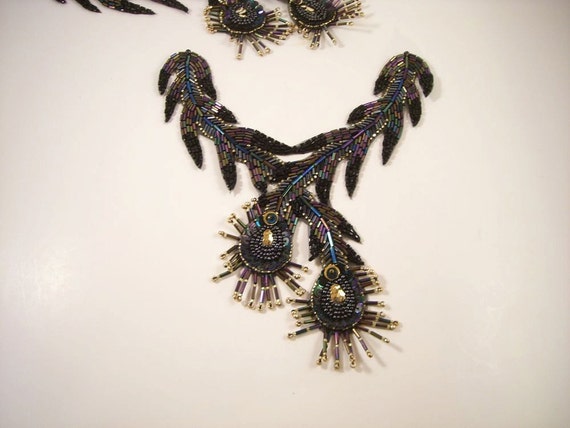 Beaded feather shop designs
