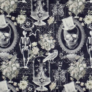 May include: A black fabric featuring a repeating pattern of white illustrations including skulls wearing top hats in ornate frames, full skeletons, floral arrangements in vases, glass cloches with botanical elements, and a perched raven.