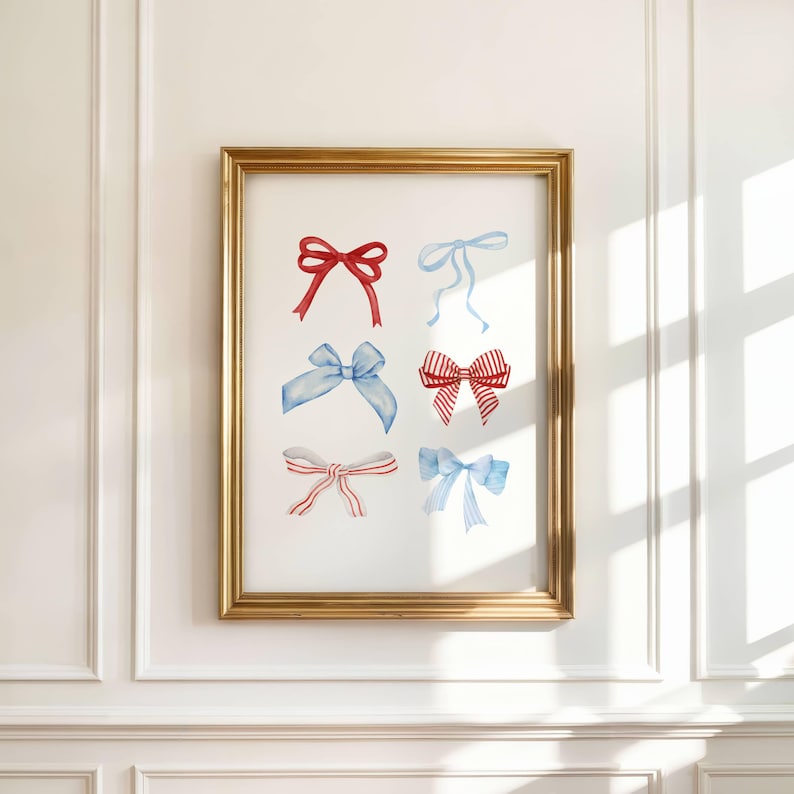 May include: A framed print featuring watercolor illustrations of six different bows in shades of red and blue. The bows are arranged in two rows of three, with varying designs and patterns. The frame is gold.