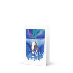 Cartão de felicitações "Orcas sob a Aurora"