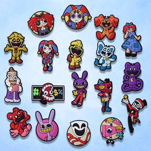 May include: A collection of colorful cartoon character charms in various shapes and designs. The charms feature a variety of characters with different expressions and outfits. The color palette includes red, yellow, blue, purple, and pink.