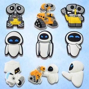 May include: Nine colorful robot-themed shoe charms. The charms feature characters from the animated film, Wall-E, in various poses and designs. The robots are primarily yellow, white, and gray with black and blue accents.