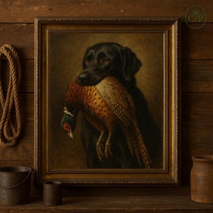 May include: A framed painting depicting a black Labrador Retriever with a pheasant in its mouth. The painting is in a gold frame. The pheasant has brown, orange, and white feathers, set against a dark background.