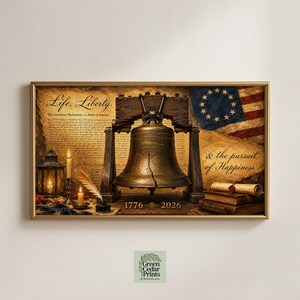May include: A framed horizontal print featuring the Liberty Bell centered between a vintage lantern, a quill, and a stack of books. The background displays the Declaration of Independence, an American flag, and the text 1776-2026, Life, Liberty, & the pursuit of Happiness.