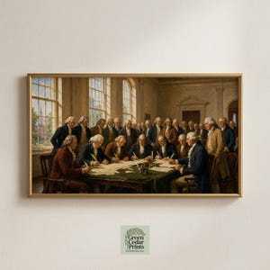 Op de afbeelding: Een ingelijste horizontale wandkunstprint die de ondertekening van de Onafhankelijkheidsverklaring toont, met een groep mannen in 18e-eeuwse kleding rond een tafel. Onder de print staat een klein vierkant logo met Green Cedar Prints.