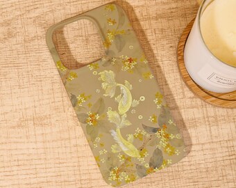 May include: A phone case with a floral and koi fish design. The case is a muted olive green color and features yellow koi fish and yellow and orange flowers. The design is repeated across the surface of the case.