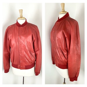 Genuine vintage 1980s distressed red pleather bomber jacket by Wilkes Bashford - Sz L to XL