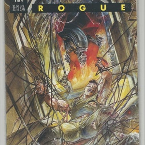May include: A comic book cover featuring an alien creature with sharp teeth and a human character trapped in a web of wires. The title of the comic is "Aliens Rogue" and the issue number is 1 of 4. The cover art is by Ian Edgington and Will Simpson.