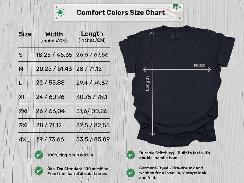 May include: A navy blue Comfort Colors t-shirt with a size chart. The chart lists sizes S to 4XL, with width measurements from 18.25 inches to 29 inches and lengths from 26.6 inches to 33.5 inches. The shirt is made of ring-spun cotton.