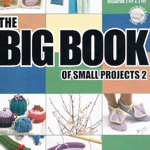 May include: The Big Book of Small Projects 2 knitting and crochet book cover featuring a variety of small projects, including a doll, slippers, a teapot cozy, and a hanger. The book is published by Patons and is book number 1268.