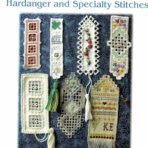 May include: A selection of handcrafted bookmarks with detailed Hardanger and specialty stitches. The bookmarks showcase diverse designs, including floral patterns, geometric shapes, and tassels. The text "Stitcher's Choice Bookmarks I" is visible.