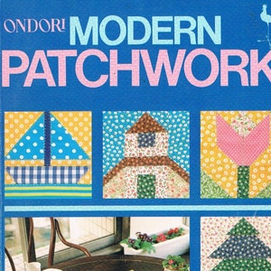 May include: A book titled "ONDORI MODERN PATCHWORK" with a rooster illustration on the cover. The book features colorful patchwork designs of a sailboat, house, tulip, Christmas tree, and another house.
