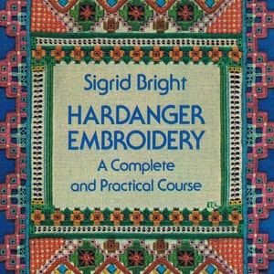 May include: A book cover with a blue background and a colourful embroidered border. The title is "Hardanger Embroidery: A Complete and Practical Course" by Sigrid Bright.