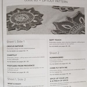 Puede incluir: Una p&aacute;gina de revista titulada "INSPIRATIONS" con el n&uacute;mero 83 y una pancarta "LIFTOUT PATTERN". La p&aacute;gina presenta dise&ntilde;os de bordado, incluyendo "CROCUS SATIVUS", "CHANTILLY" y "POSTCARD FROM PROVENCE". Otros dise&ntilde;os incluyen "SOFT TOUCH" y "HUMMINGBIRD".
