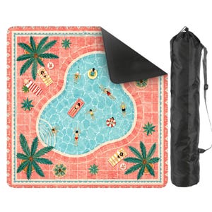 May include: A square outdoor blanket featuring a top-down illustration of a swimming pool with turquoise water, surrounded by a coral-colored tiled deck, palm trees, and people swimming or lounging. The blanket includes a black carrying bag.