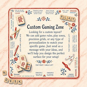 May include: A square fabric gaming mat with a cream background, red stitched edges, and blue and red floral motifs. It features Mahjong tiles, game rules, and text including Custom Gaming Zone, with scattered letter tiles spelling out N DESK.