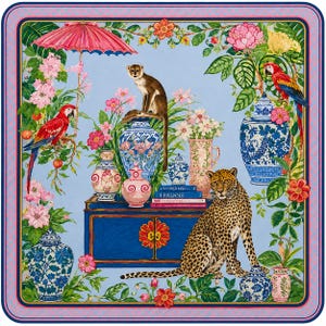 May include: A square silk scarf featuring a light blue background with a central blue cabinet, a leopard, a monkey, and two red parrots. The design includes various blue and white porcelain vases, pink flowers, a pink parasol, and stacked books.