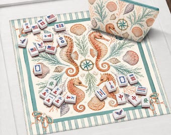 May include: A Mahjong set with a marine theme, featuring seahorses, seashells, and a compass rose design. The set includes tiles with various symbols and a matching zippered pouch. The background is a patterned mat with a striped border.