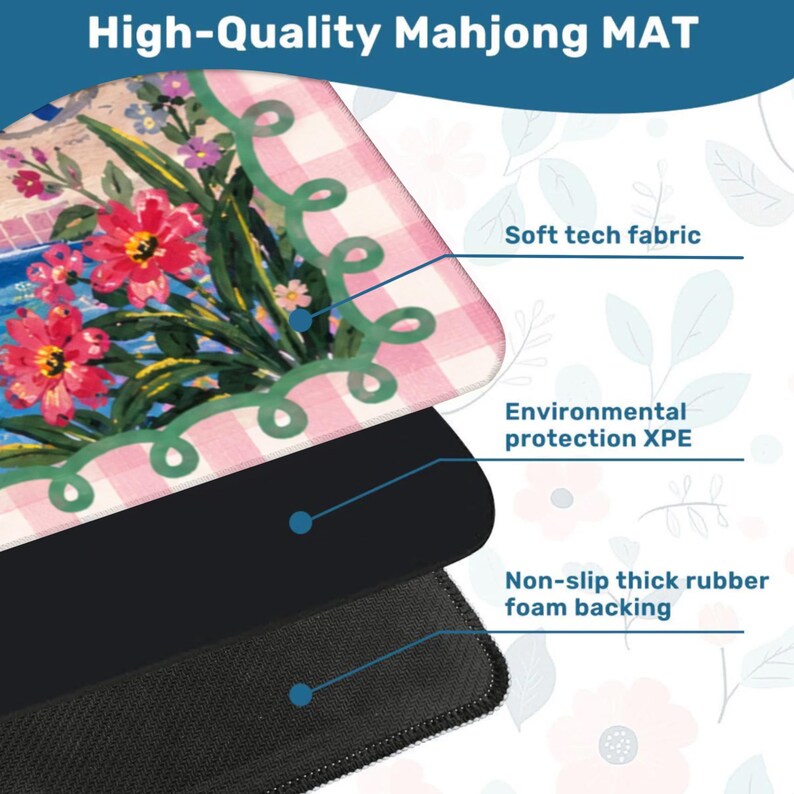 May include: A high-quality Mahjong mat with a floral design featuring pink and red flowers, a green border, and a pink and white checkered pattern. The mat has a soft tech fabric, environmental protection XPE, and a non-slip thick rubber foam backing.