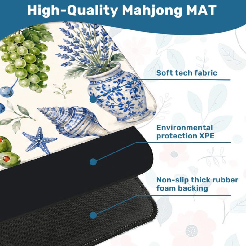 May include: A high-quality Mahjong mat with a decorative design featuring grapes, olives, a seashell, and a blue and white vase. The mat has a soft tech fabric surface and a non-slip thick rubber foam backing.