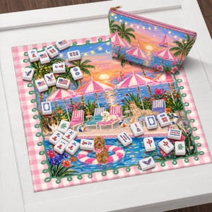 May include: A beach-themed Mahjong set with tiles featuring American flag designs and Chinese characters. The set includes a pink zippered pouch with a beach scene, a pink and white checkered mat, and a dog in a pool float.