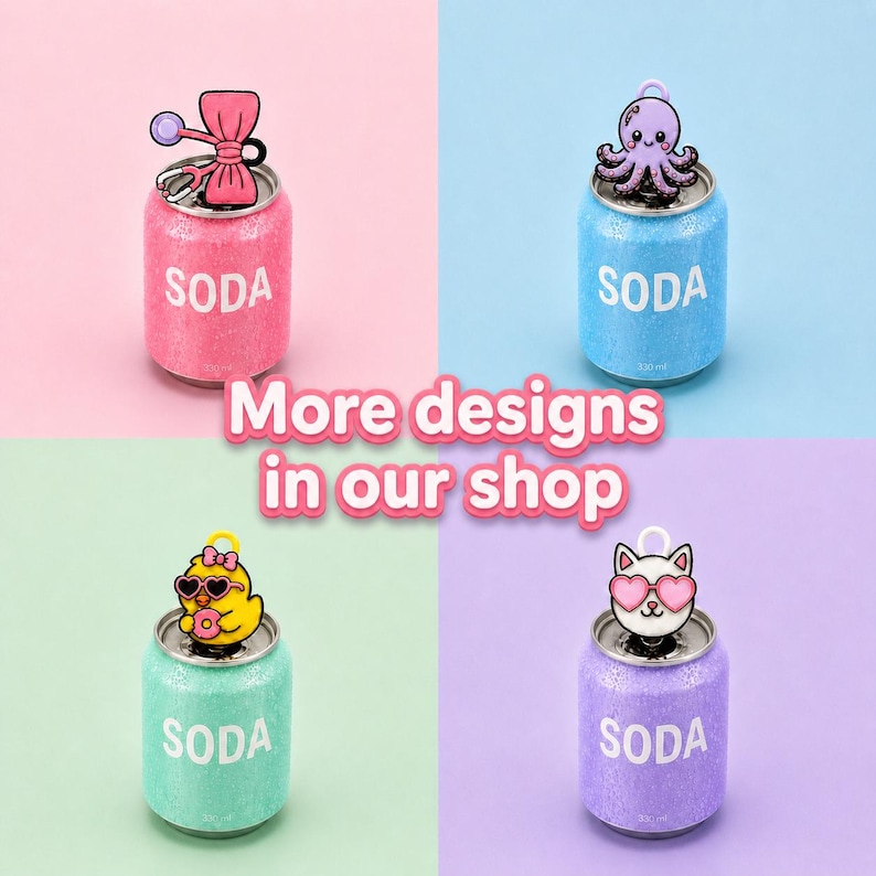 May include: Four glittery soda can charms in pink, blue, green, and purple. Each can has a different charm on top: a bow, an octopus, a chick with sunglasses, and a cat with heart-shaped glasses. The word "SODA" is printed on each can.