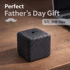 May include: A black, cube-shaped object with a textured, wave-like pattern on its sides. The top has a circular opening. Text reads "Perfect Father's Day Gift" with a mustache graphic and "STL 3MF files".