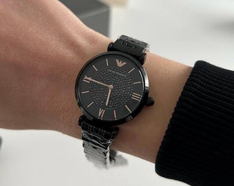 Emporio Armani AR11245 Gianni T-Bar Montre Femme Cadran Noir Cristal Or Rose Inoxydable