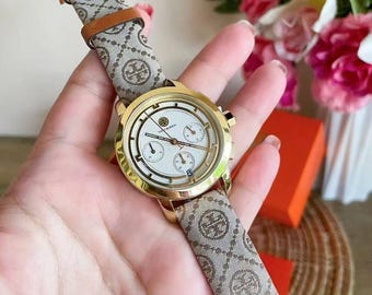 Tory Burch Reva Chronograph Women’s Logo Canvas Strap Watch   .New with tags