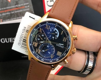 Guess Men's Blue Dial Rose Gold Multifunction Watch – Brown Leather Strap