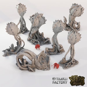 Può includere: Una collezione di elementi di terreno grigi a tema fantasy, tra cui strutture simili a piante e archi, con piccole figure rosse. I pezzi hanno un aspetto strutturato simile alla pietra. I loghi Txarli Factory e SEED PRINTS sono visibili.