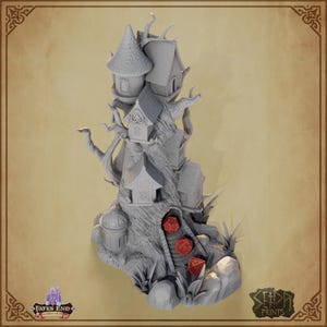 May include: A detailed, gray miniature fantasy treehouse with multiple levels, small houses, and a domed structure. Red dice are placed on a staircase leading up to the treehouse. The base has a rocky texture with some greenery.