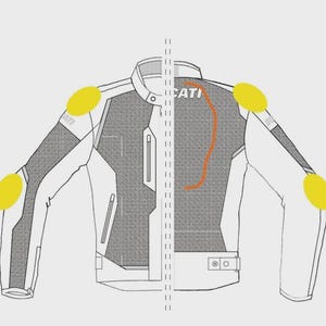 Pode incluir: Casaco de motociclismo branco e cinzento, com almofadas de prote&ccedil;&atilde;o amarelas nos ombros e cotovelos. O casaco tem a palavra "CATI" nas costas e um fecho de correr.