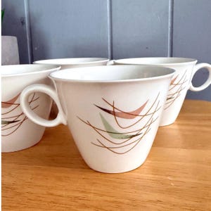 Franciskanska tekoppar i vitsten, Swing Time Boomerang, 4-pack, MCM, Japan Vintage