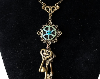 Steampunk Key Necklace: Oxidized Brass Cog Pendant with Swarovski Crystal