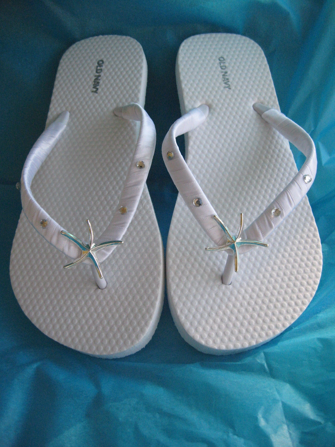 white flip flops with rhinestones