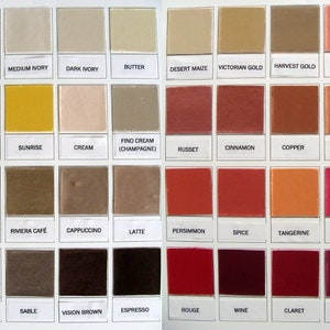 May include: A color chart with 48 different shades of paint, organized in rows and columns. The colors range from light ivory to dark brown, and from red to burgundy. The names of each color are listed below each swatch.