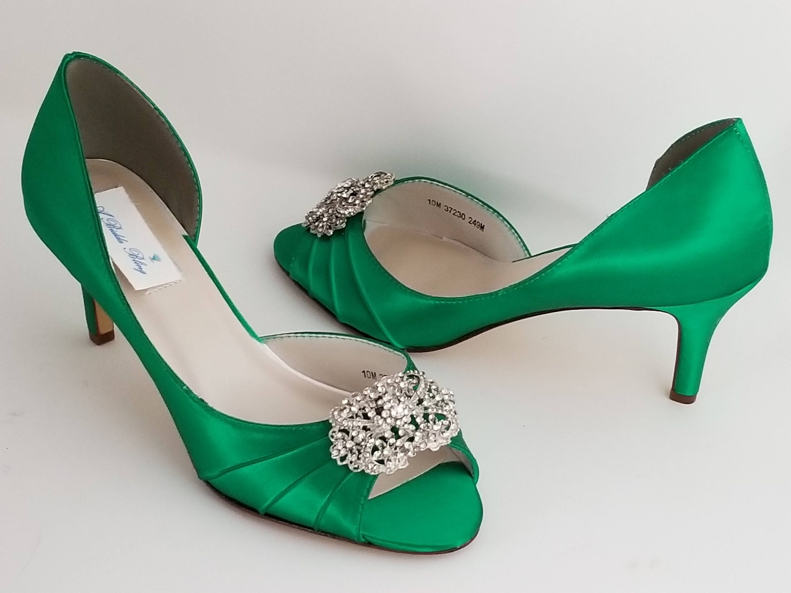 emerald green dress and silver shoes