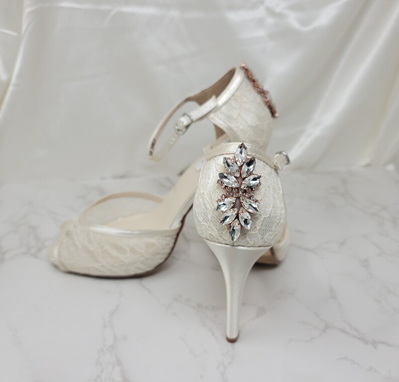 Ivory lace bridal shoes with rose gold design