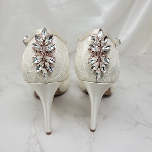 Ivory lace wedding shoes with rose gold design