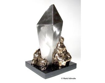 Earth Essentials #1 sculpture honoring the Earth's very essence - stainless steel & bronze on black granite