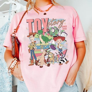 May include: A set of three ceramic mugs with a speckled, matte finish. The mugs are in shades of cream, light gray, and dark gray. Each mug has a simple, minimalist design, perfect for coffee or tea.